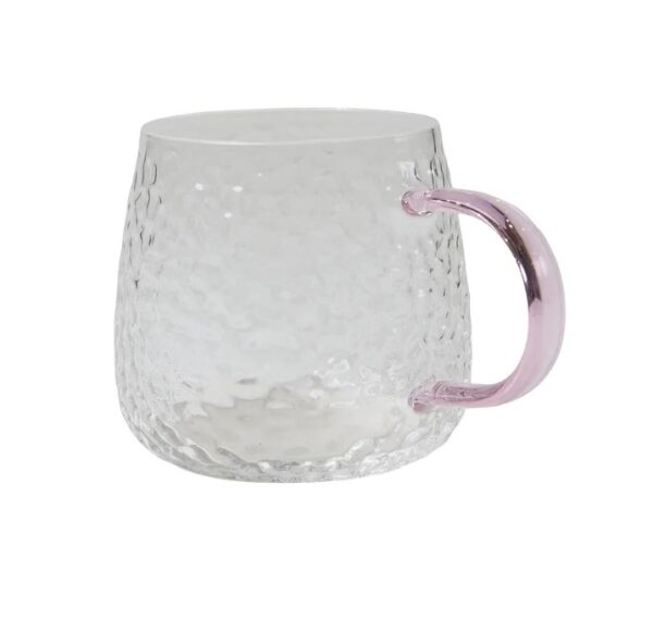 Glas med rosa handtag